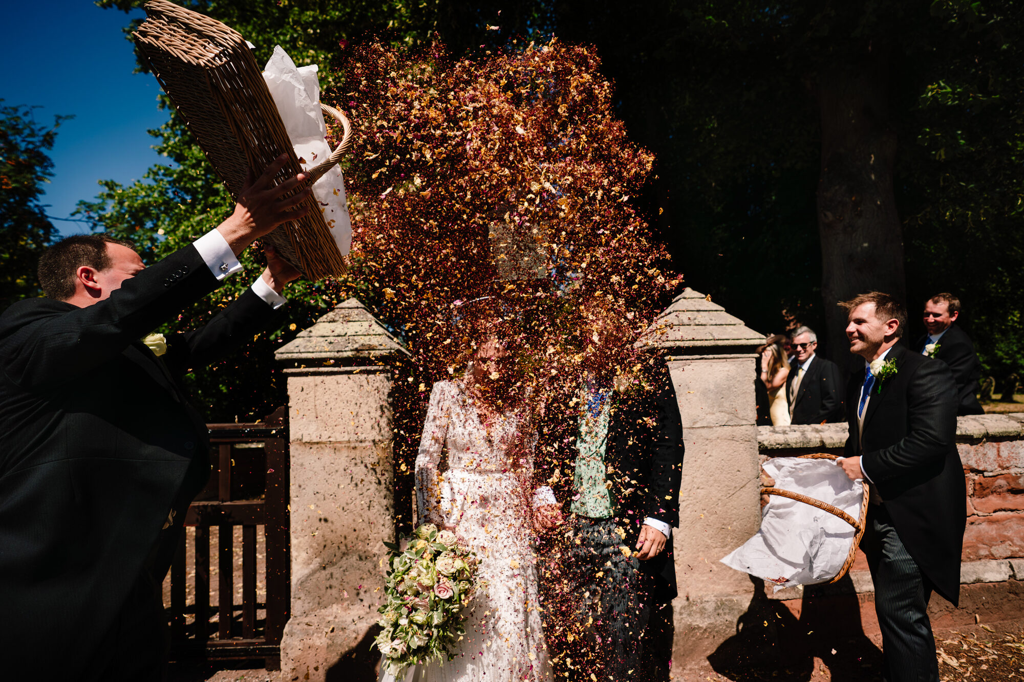 A basket of confetti thrown over the couple at the church gates